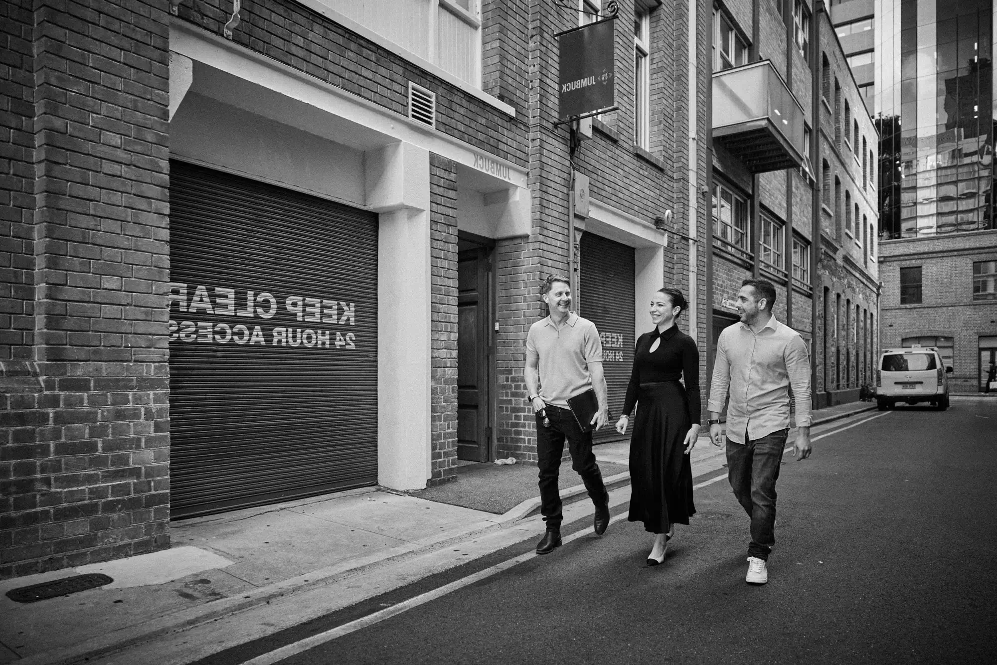 People Walking down an inner city laneway