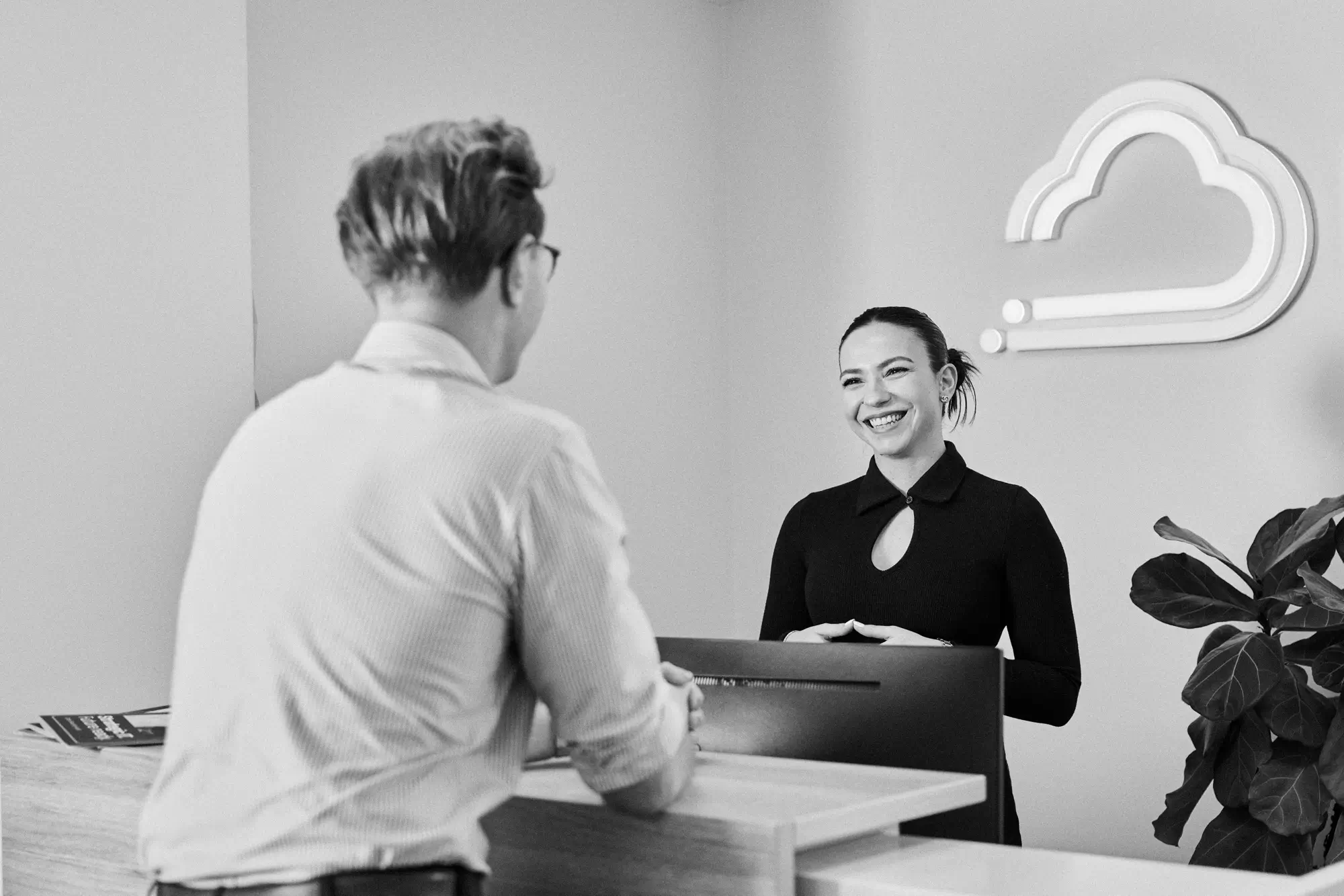 Two people talking about work